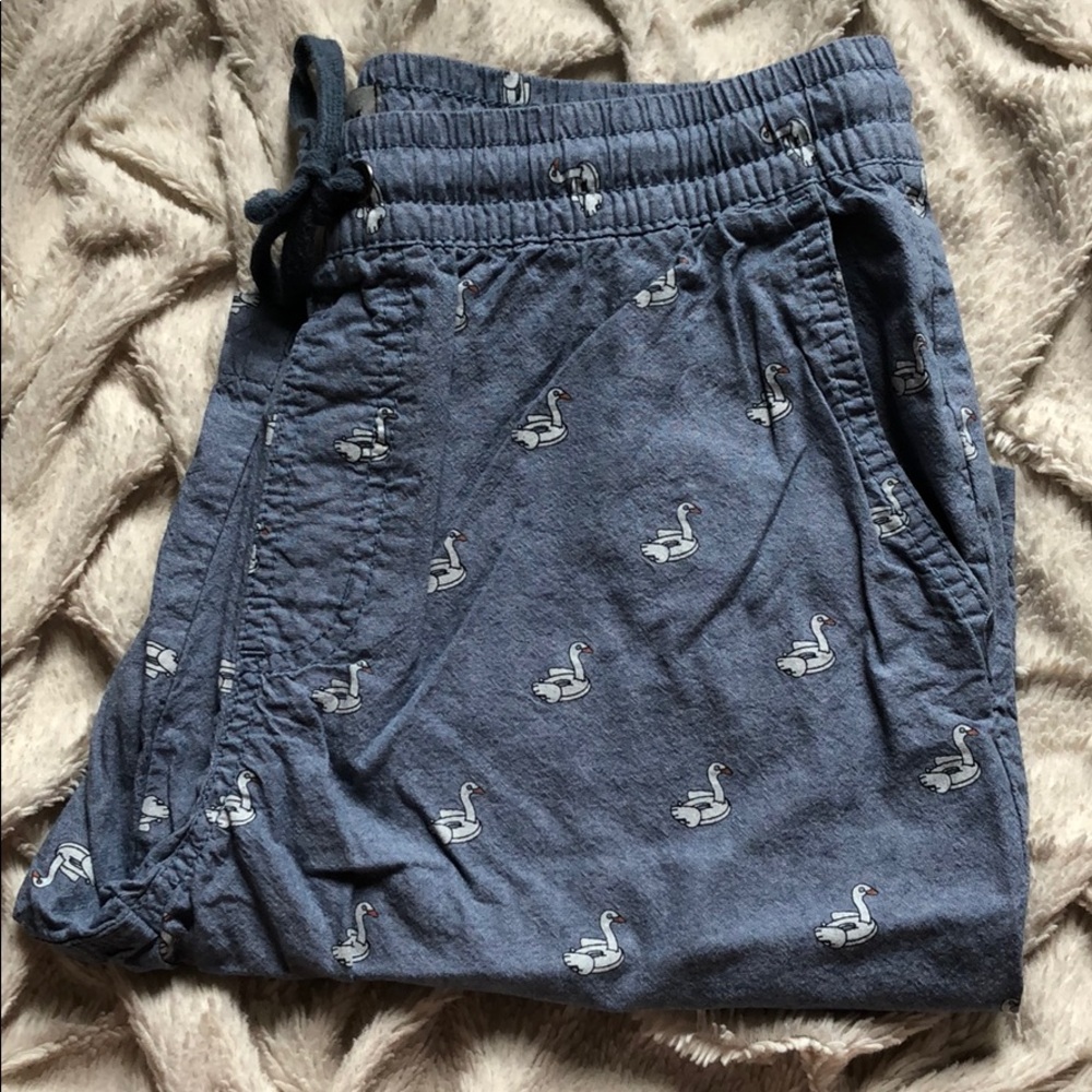Blue shorts with white geese design.